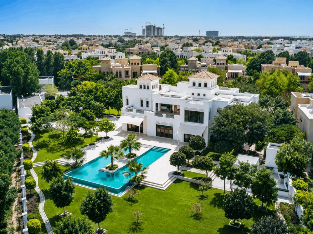 Aerial view of a luxury villa, swimming pool and gardens in Al Barari, Dubai