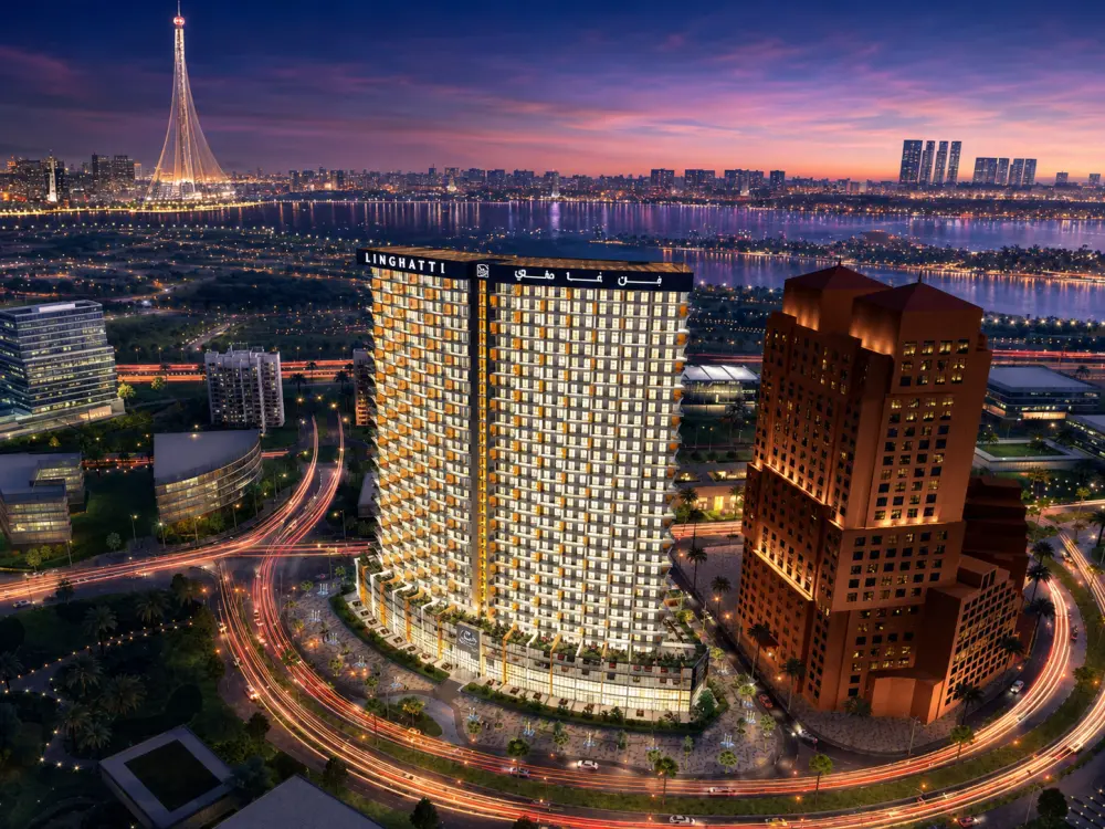 Al Jaddaf waterfront buildings and roads illuminated at night