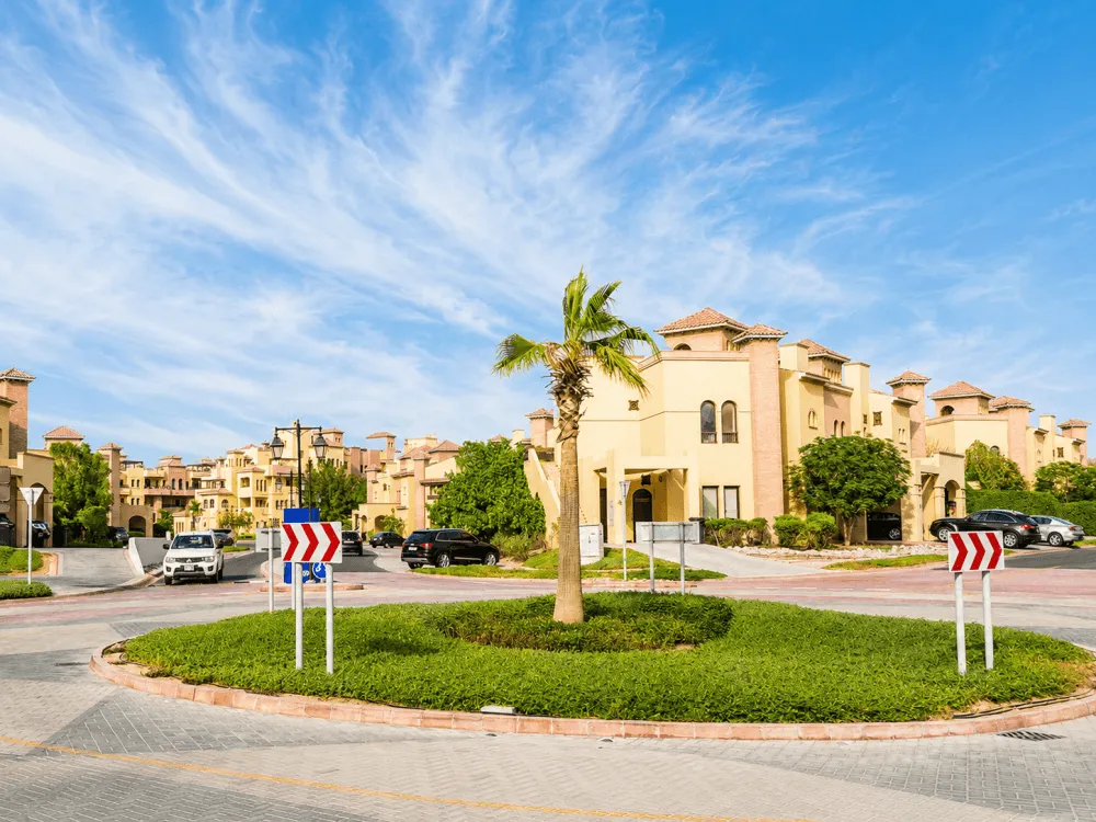 Villas around a landscaped roundabout in Mirdif, Dubai